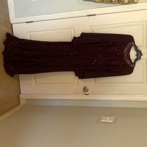 Long elegant jewel enhanced evening/ball gown.